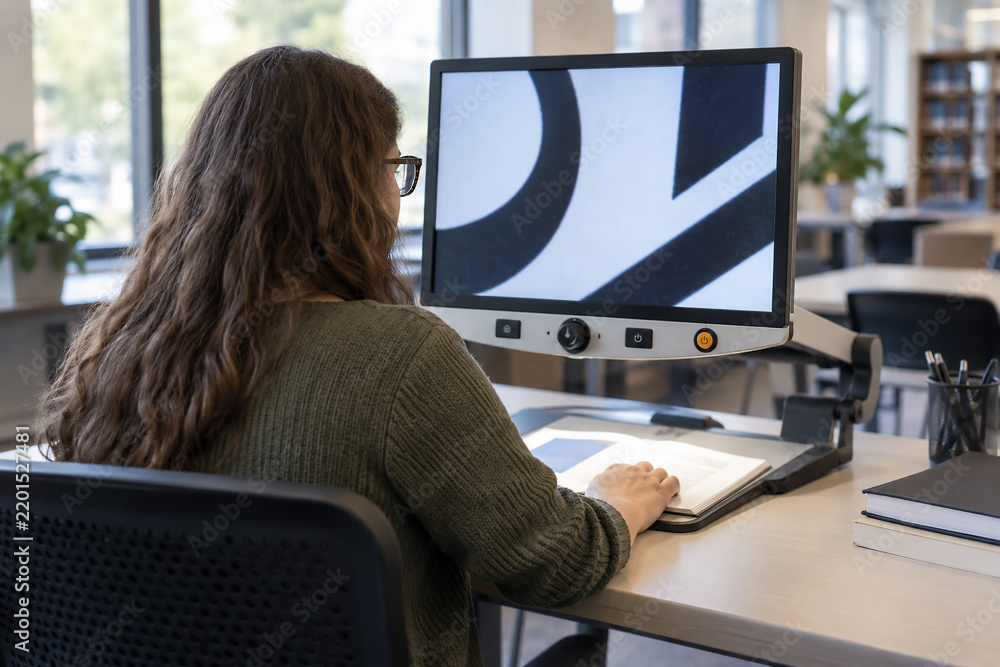 Reading with a desktop video magnifier